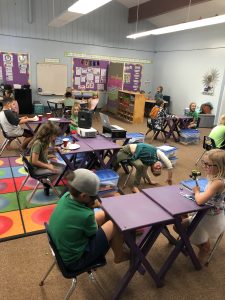 Alakai O Kauai 1st graders enjoy a tea party in the classroom