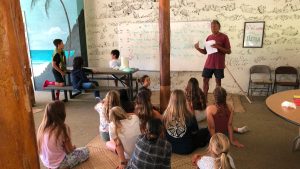 AOK teacher and learns in a classroom 