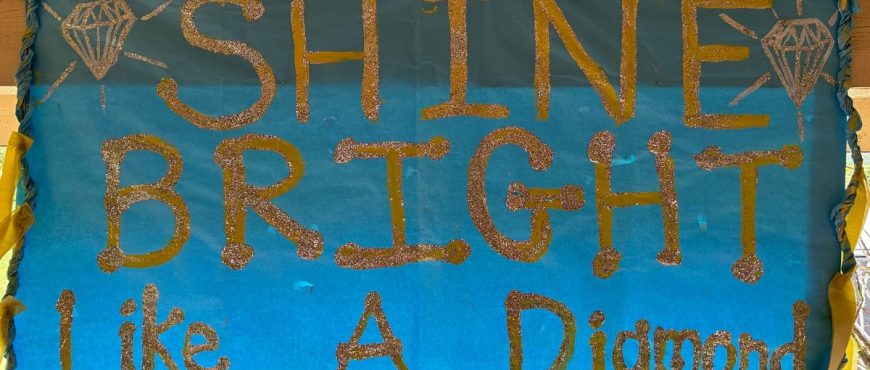 blue poster that reads "shine bright like a diamond"