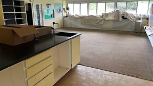 image of a large empty room, the science lab at AOK, waiting to be remodeled