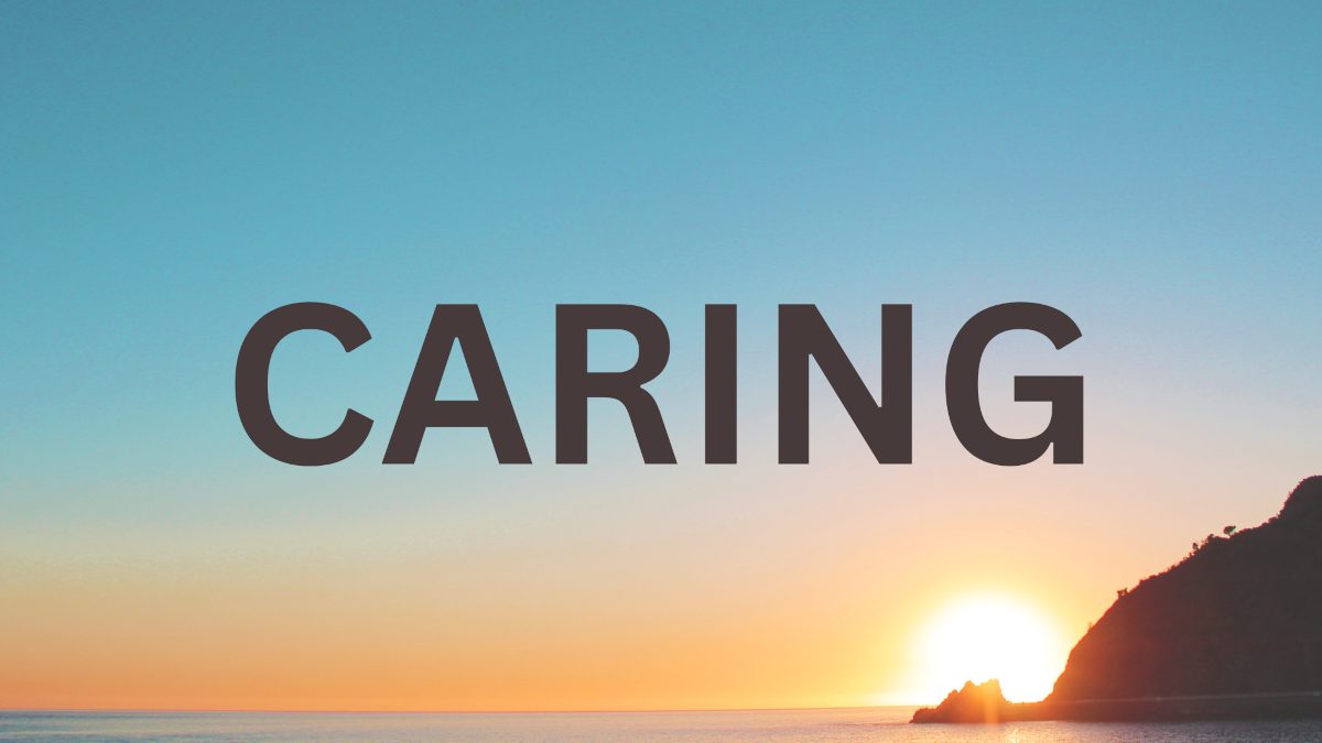 brown text "caring" with a background of the sun setting