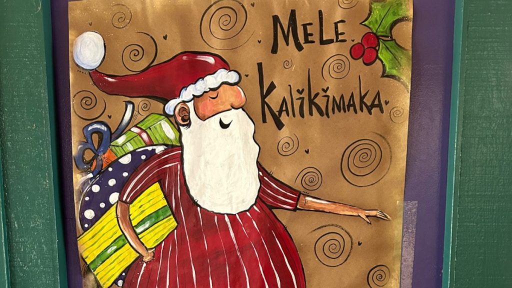 image of a Santa Claus with presents for the AOK holiday break
